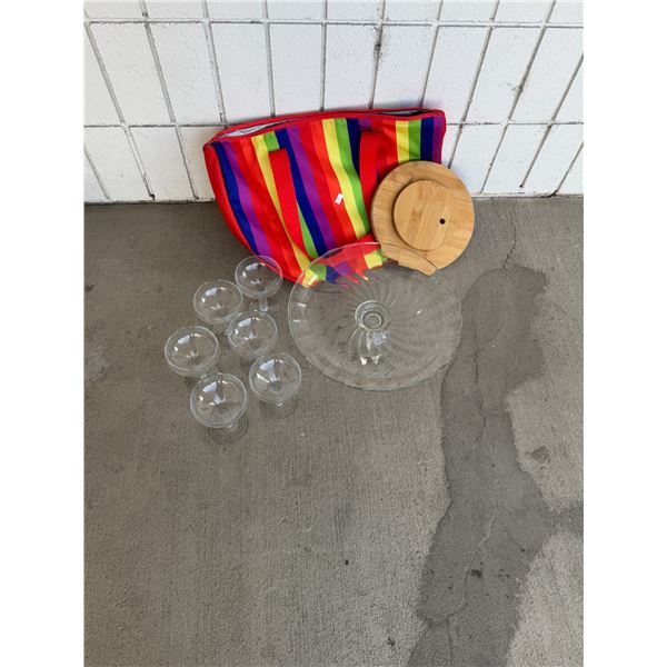Bag and cake plate and glasses