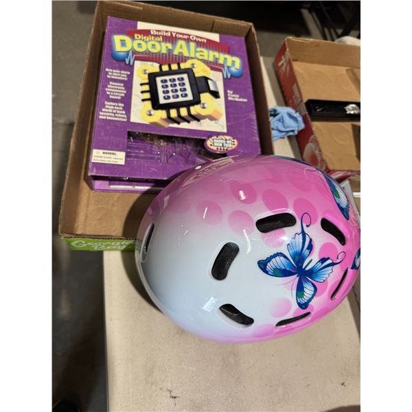 Helmet and door alarm