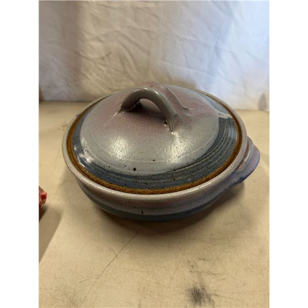 Pottery dish stamped on bottom