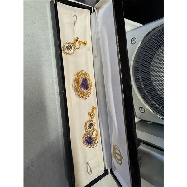 Brooch, earrings, and ring