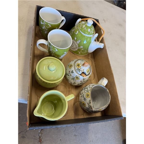 Cream and sugars, teapot and mugs