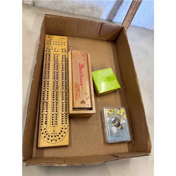 Domino's cards, crib, board, and travel topics to go