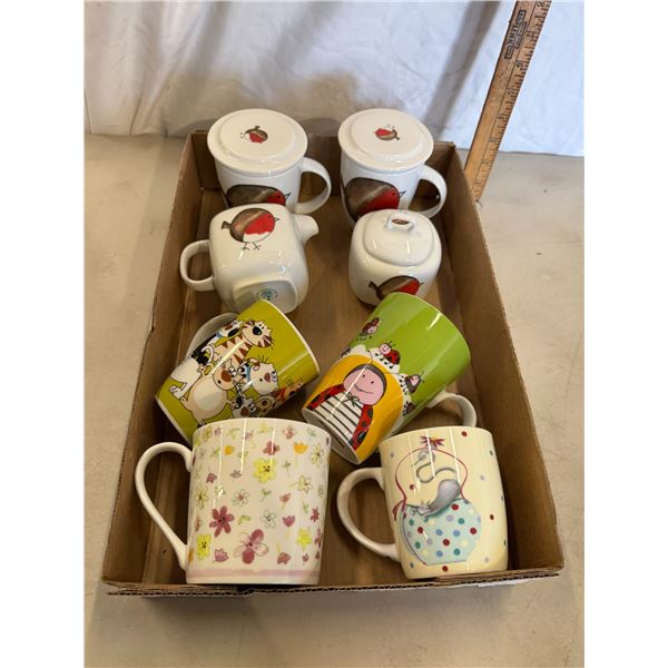 Mugs and cream and sugar items