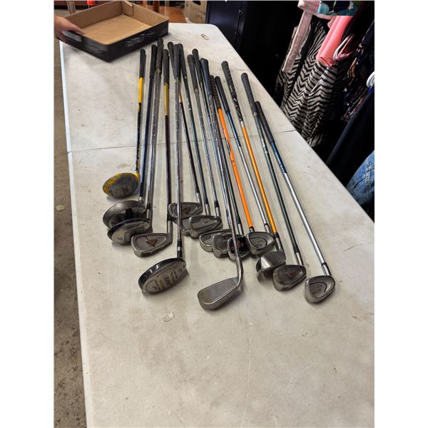 Assorted golf clubs
