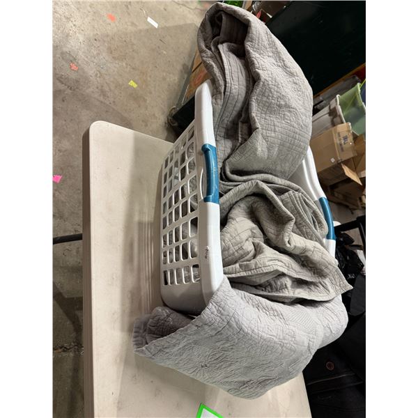 King comforter, two pillow shams and a laundry basket