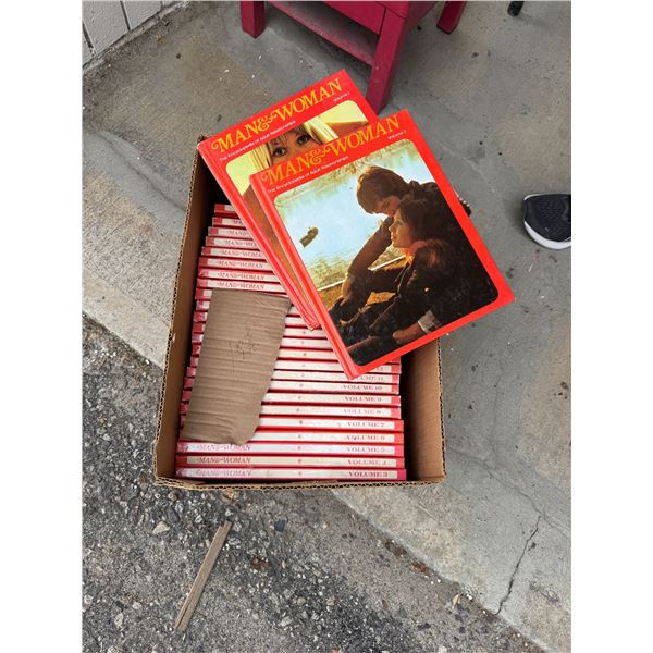 Man and woman and encyclopedias