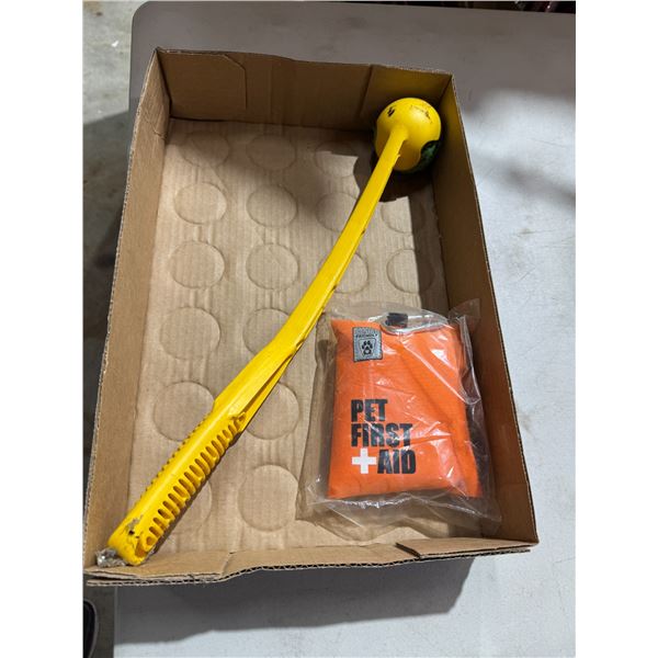Pet first aid and ball and thrower