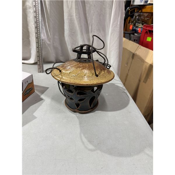 Hanging pottery candle decor