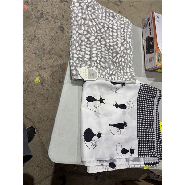 Bathmat and shower curtain
