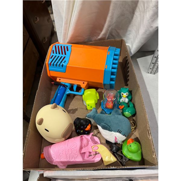 Bubble blower and ducks and other toys