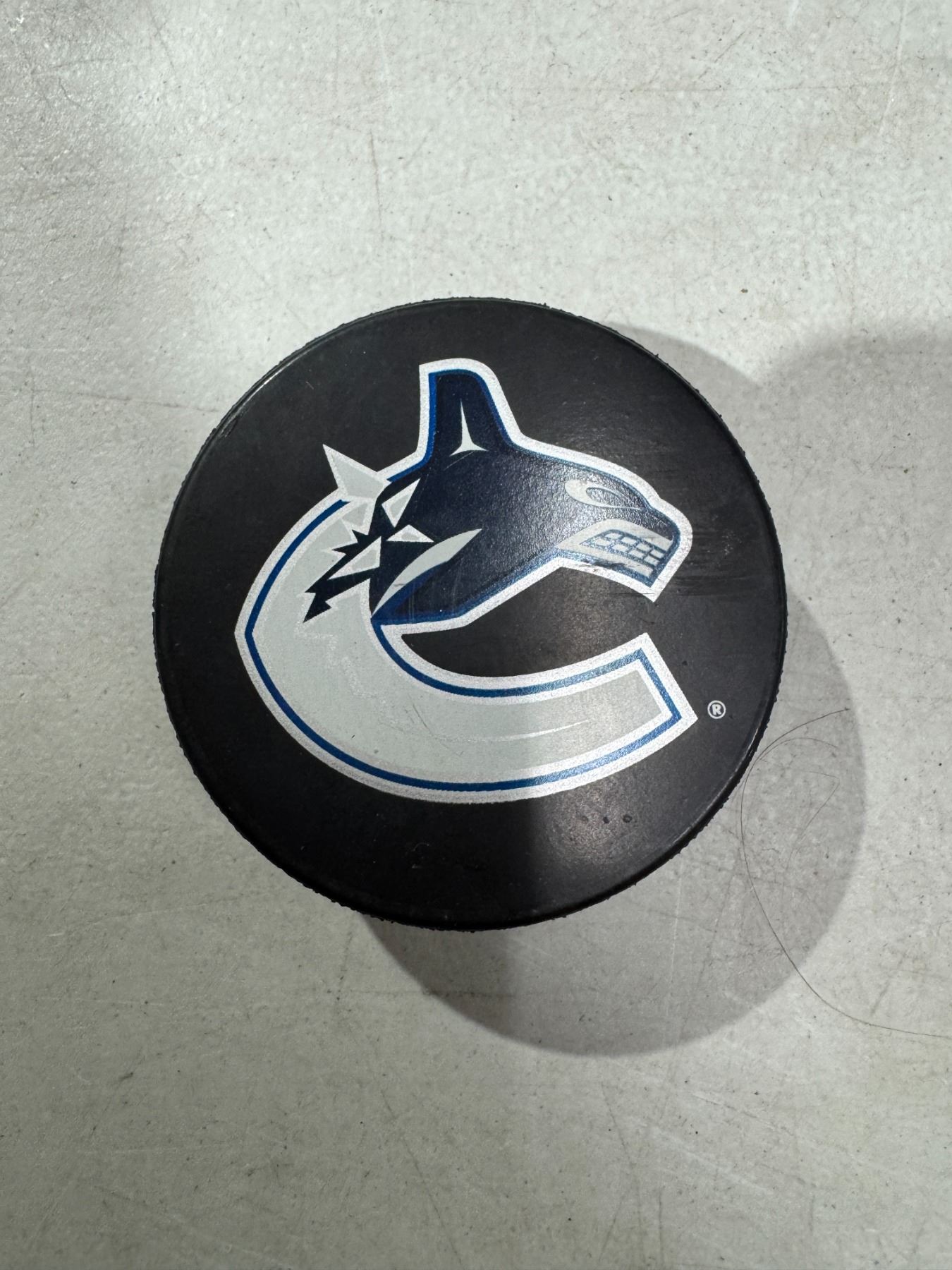 Canucks hockey puck