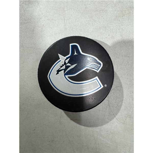 Canucks hockey puck