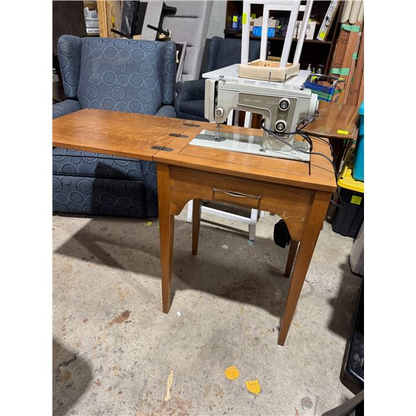 Sears Kenmore sewing machine in  cabinet