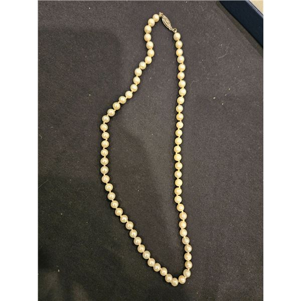 Knotted 18" knottedstrand of pearls. 69 Akoya Pearls