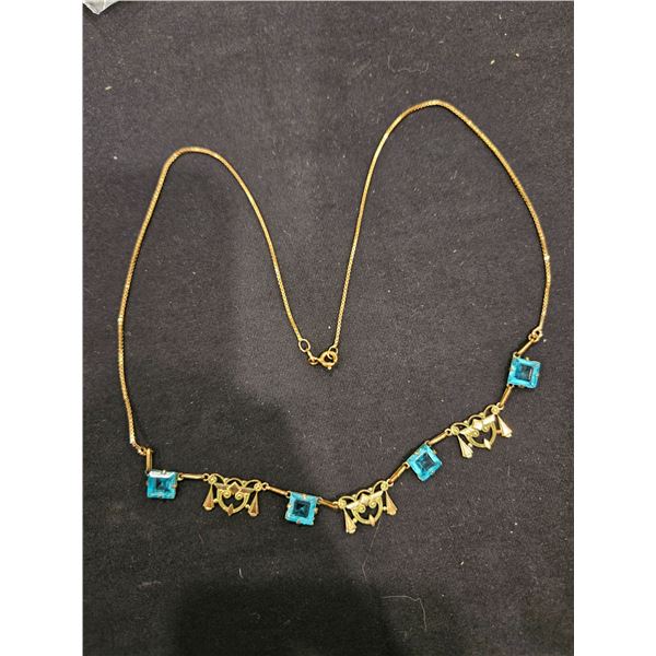 Station style costume necklace