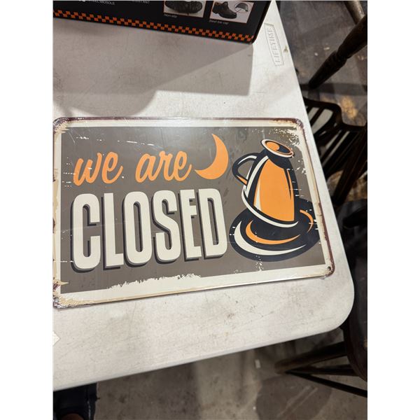 Tin sign we are closed