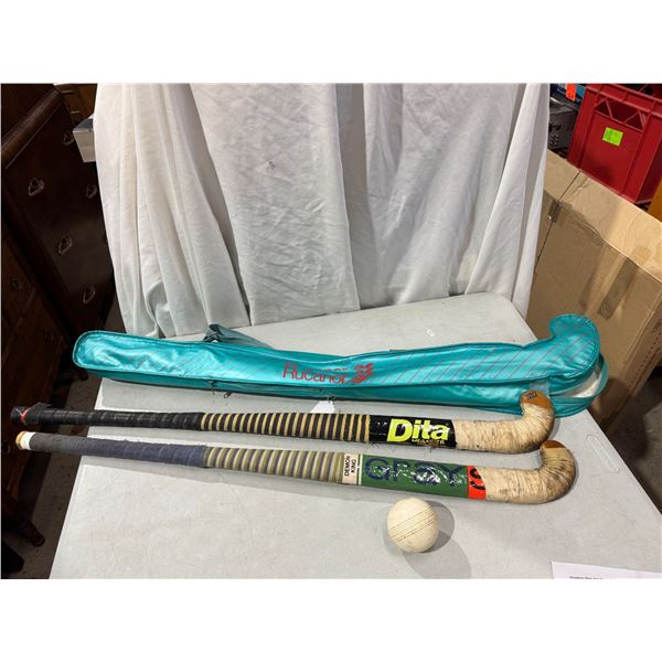 2 Field hockey sticks