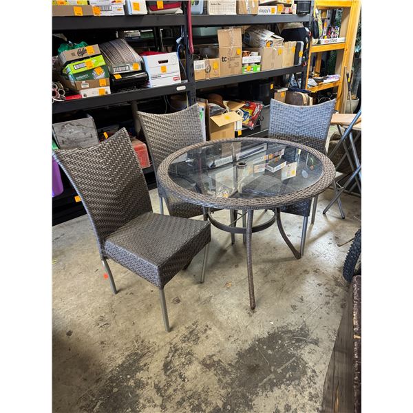 Patio table and three chair chairs