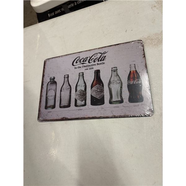 New Coca-Cola tin sign