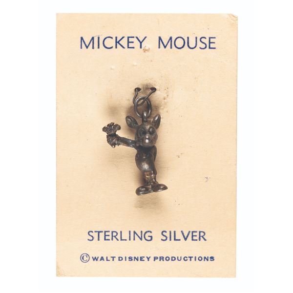 A Mickey Mouse Sterling Silver Charm.