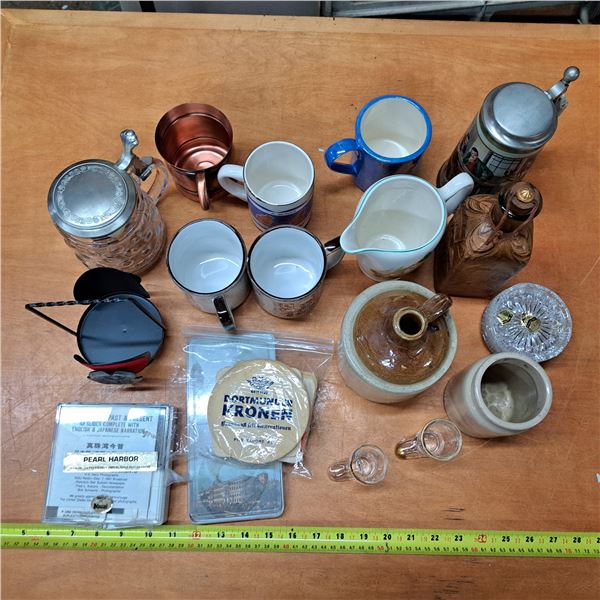 lot of decore items, mugs, glasses and pearl harber slides