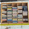 Image 1 : Cassettes in a wood storage bin
