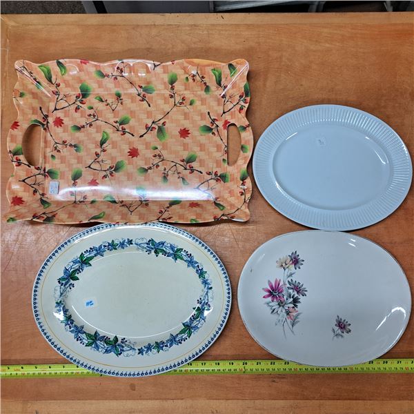 3 decorative dishes and plastic platter