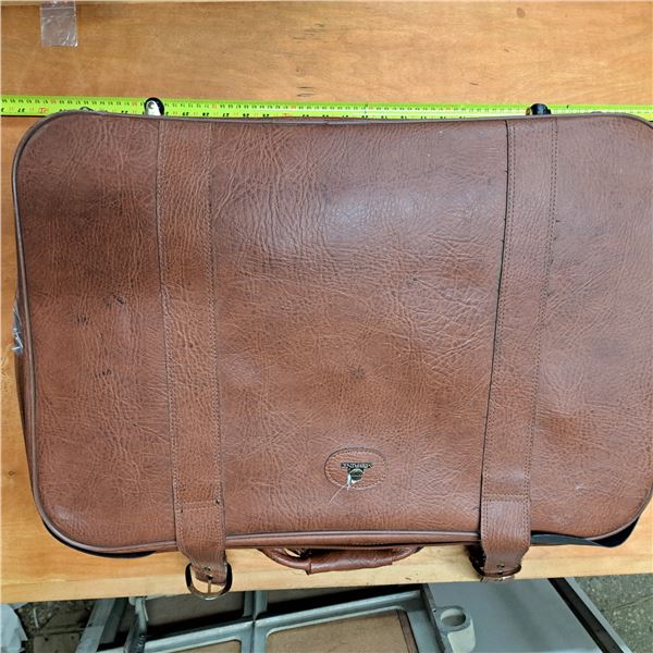 leather suit case with tarp, high vise vest, souls for shoes