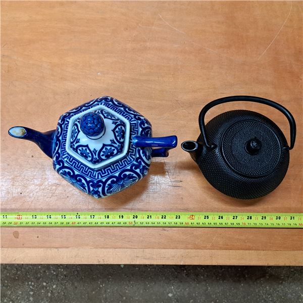 2 tea pots- one is bombay