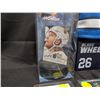 Image 3 : Lot of sealed sports card, Blake Wheeler Stand, William Karlson Card and puck, and Pokemon Kyorge an