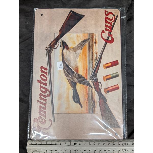 Remington Tin Sign Approx. 8"x11 3/4"