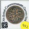 Image 1 : 1974 New Zealand Dollar commemorating the Commonwealth Games. BU. Housed in a hard plastic holder.