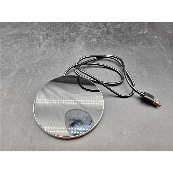 Round USB-Powered Charging Device with Cord