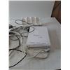 Image 2 : Wii console with Remote, and remote charger (Turns On)