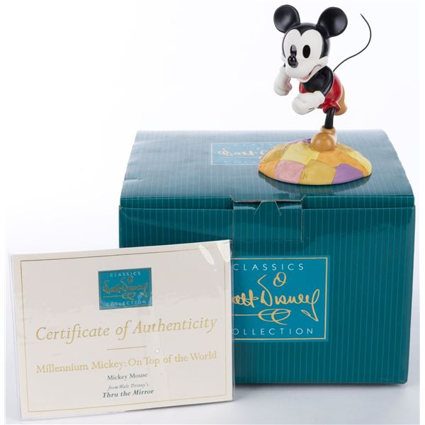 A WDCC “Millennium Mickey" Figurine.