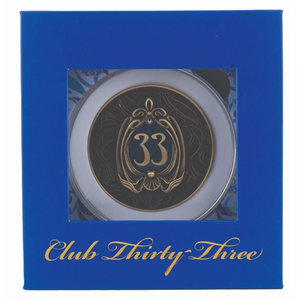 A 2025 Club 33 Challenge Coin.