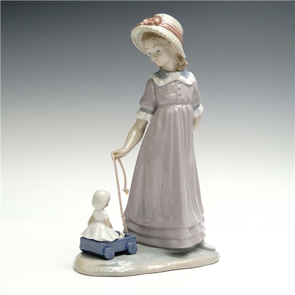 Lladro Porcelain Figurine, Girl with Toy Wagon 01005044