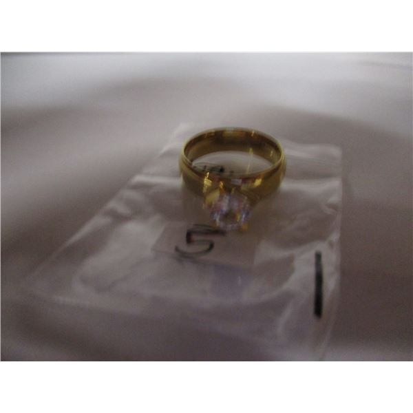 NEW:  GOLDTONE ENGAGEMENT RING WITH CLEAR STONE (SIZE 7.5)