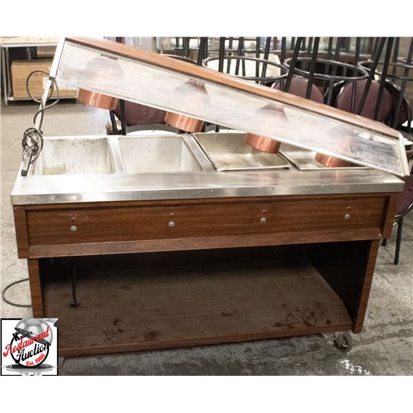 QUEST 4 WELL STEAM TABLE ON CASTORS W/ UNDER SHELF