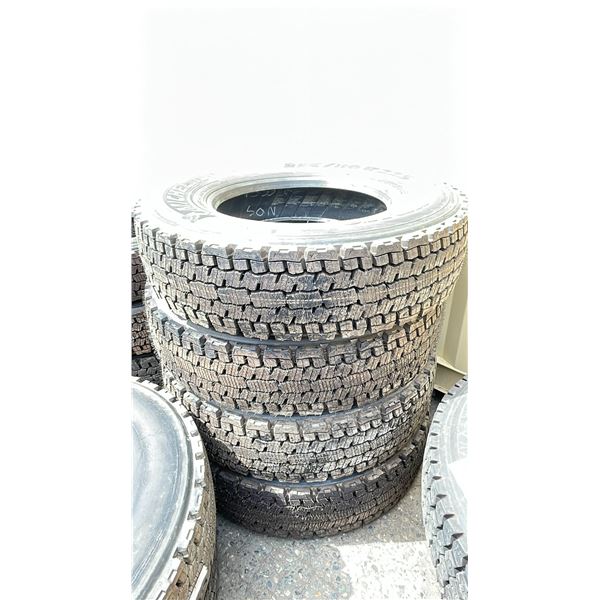 STACK OF 4 VEHICLE PERFORMANCE TIRES