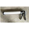Image 2 : (5) COX AVON 600 CAULKING GUNS AND LARGE CASE OF YELLOW 2N1006 CONE NOZZLES