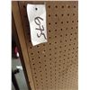 Image 6 : Folding pegboard used for display. Two sections.