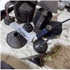 Image 2 : Oil cans and funnels.