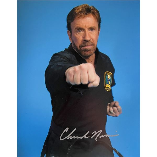 Chuck Norris signed photo. GFA Authenticated