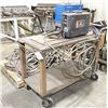 Image 1 : MILLER SUITCASE 12RC 24V WIRE FEEDER IN RUGGED HARD-SHELL CASING W/ ATTACHED TORCH & HEAVY-DUTY