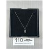 Image 1 : 10KT White Gold 6x4 mm Oval Cut Aquamarine and Diamond Pendant on 20" 10KT White Gold Curb Link Chai
