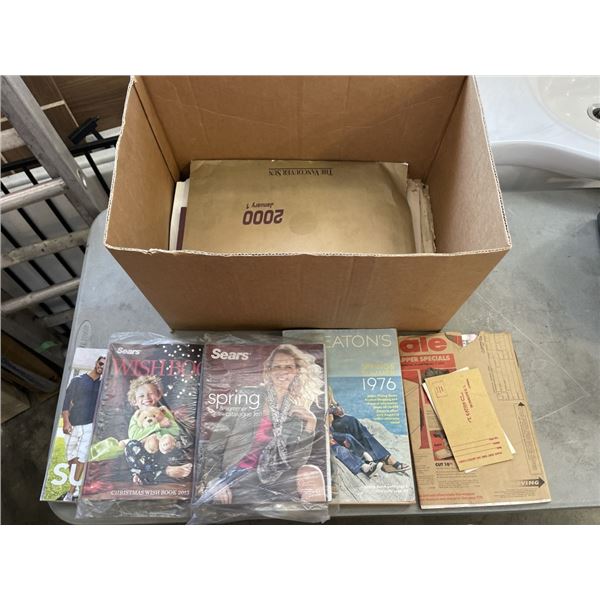 BOX OF NEWSPAPER FROM 1952+ 2 EATONS CATALOGUES, 1 STILL UNOPENED, 3 SEARSD 2 ARE SEALED