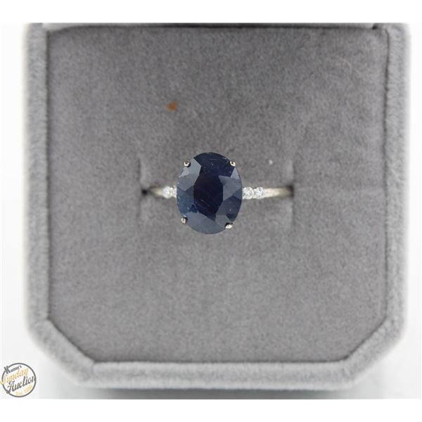 #2718-10 KT WHITE GOLD RING WITH OVAL SHAPED