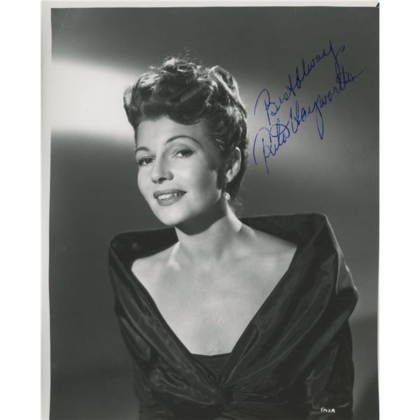 Rita Hayworth signed photo. GFA Authenticated