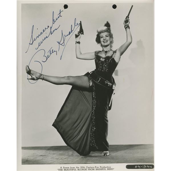 Betty Grable signed movie photo. GFA Authenticated